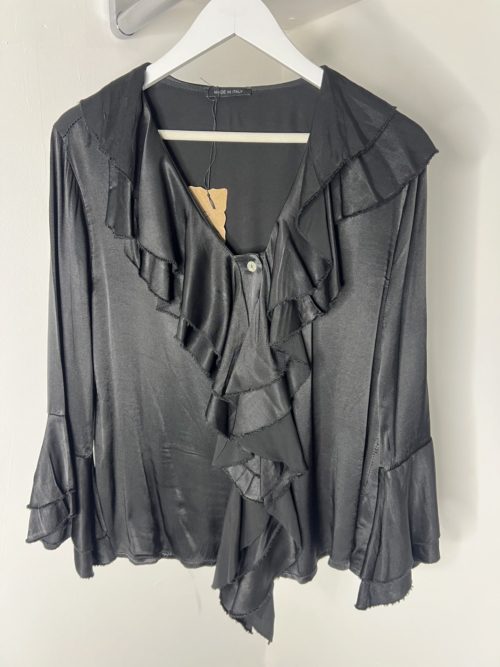 doube frill satin blouse haning up