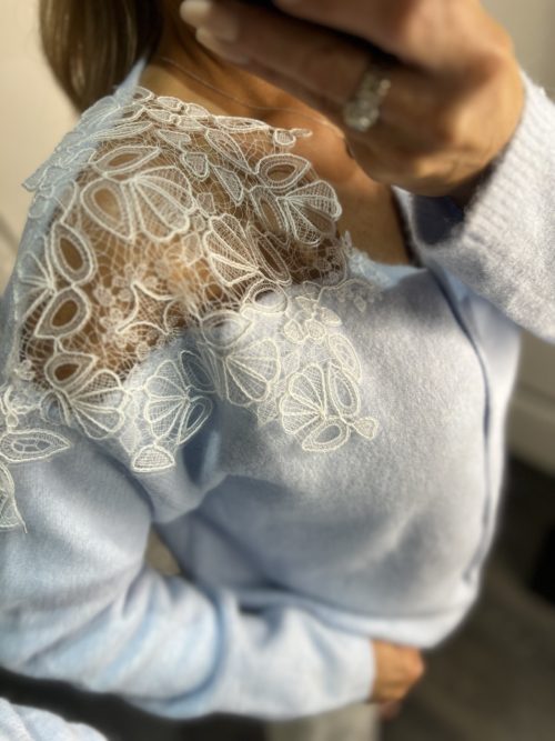 blue jumprer woith lace