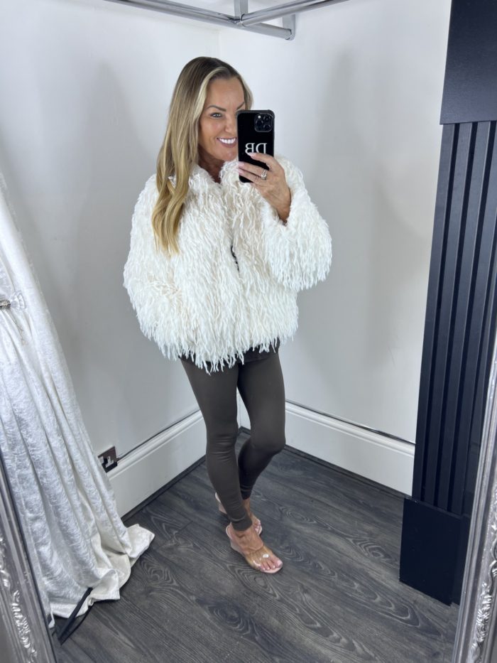 white shaggy jacket